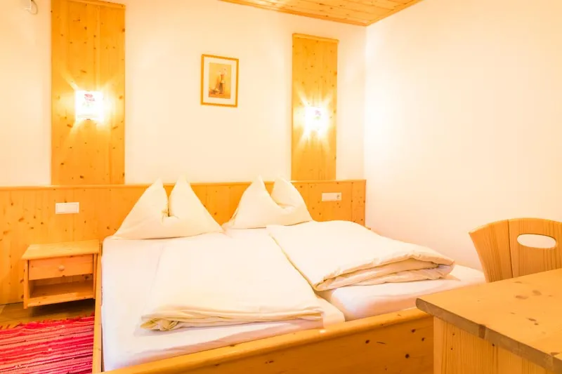 Ferienwohnung Typ A1 Bauernhaus - geräumige Familienwohnung mit Balkon und Bergblick